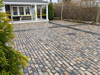Newly installed cobblestone driveway and courtyard